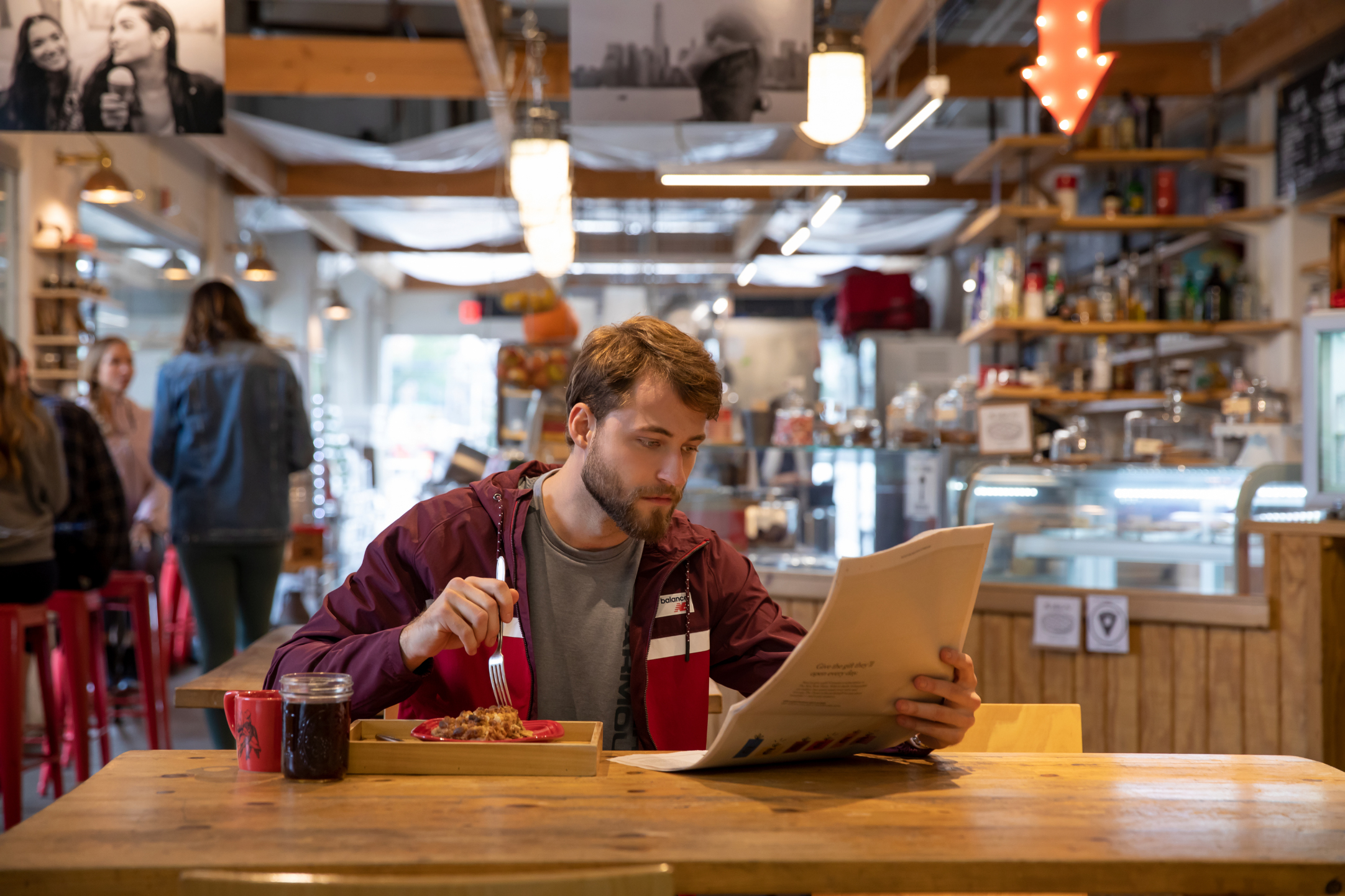 man eating at buckets and bay gelato in jersey city