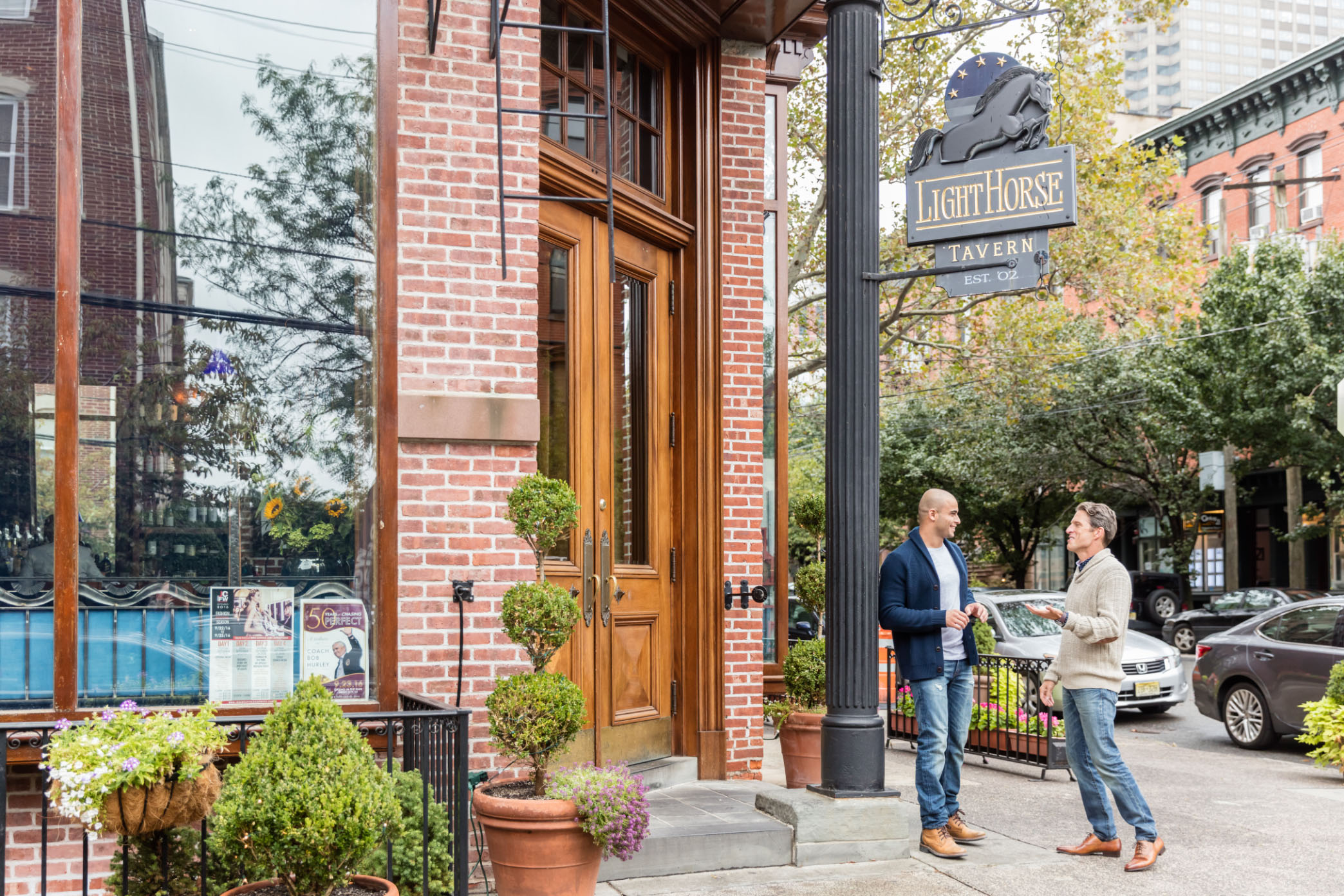 people talking otuside of light house tavern downtown jersey city