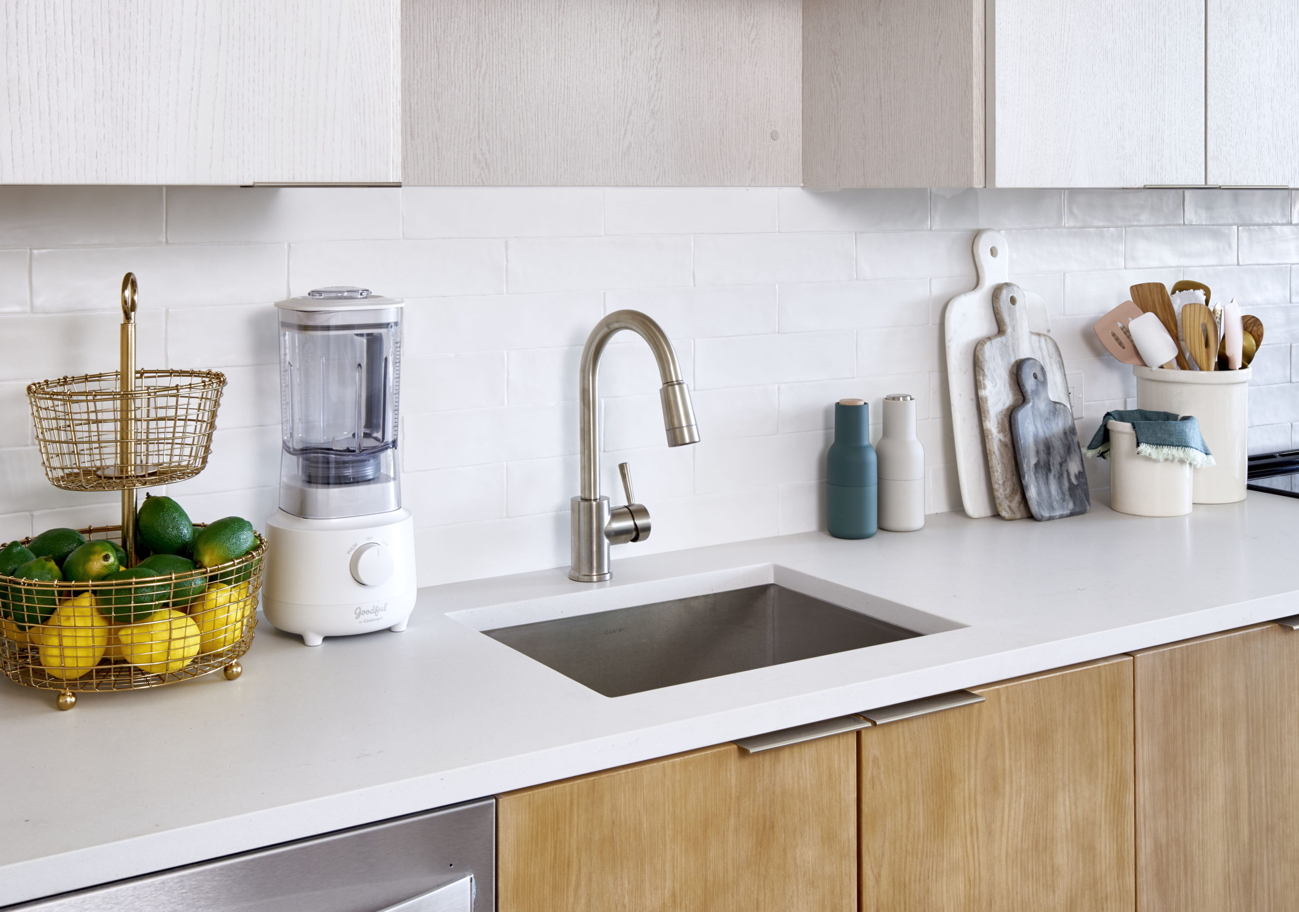 white counter tops with light wood cabinets vyv